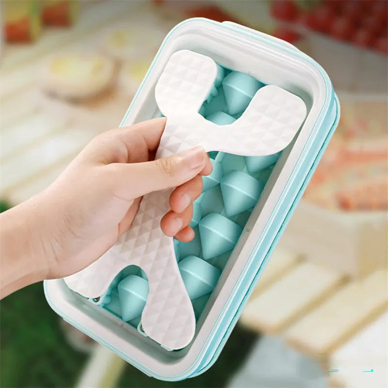Portable silicone ice ball mould and water bottle in light grey, sky blue, or white, showing 2-in-1 design.