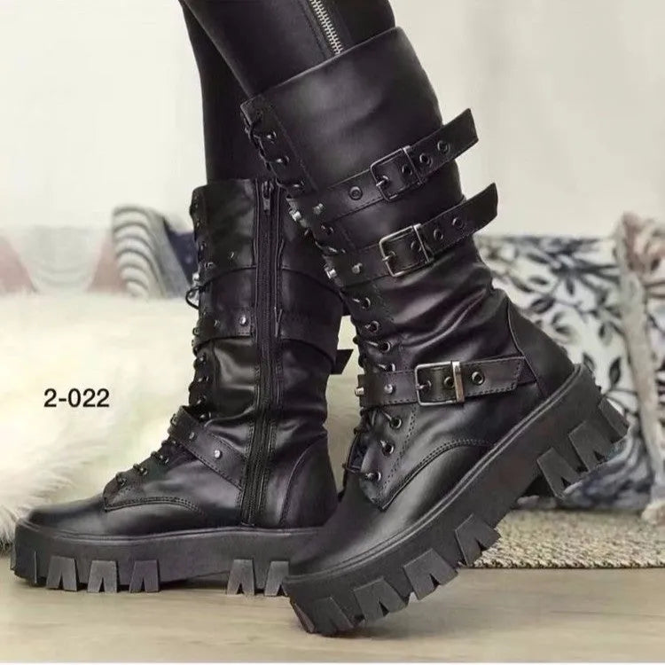 Black women's mid-calf boots with metal buckles and a side zip on a white background.