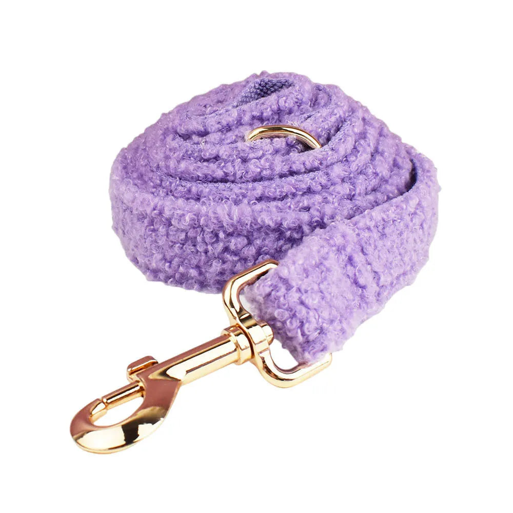 Four-piece dog clothing set showing collar, leash, vest and bow tie for small pets