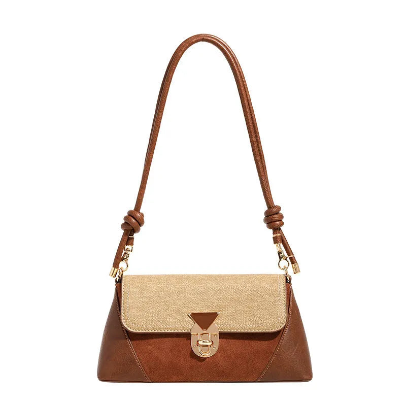 Women's soft PU underarm baguette shoulder handbag in black and caramel colours with single strap