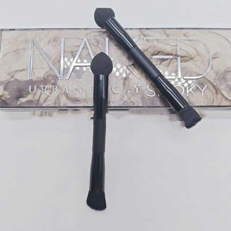 Black wooden-handled concealer brush with a sponge stick applicator tip.