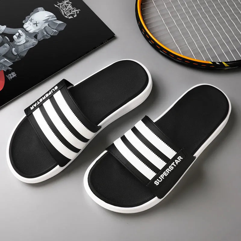 Non-slip bathroom slippers in black green and white with rubber outsole