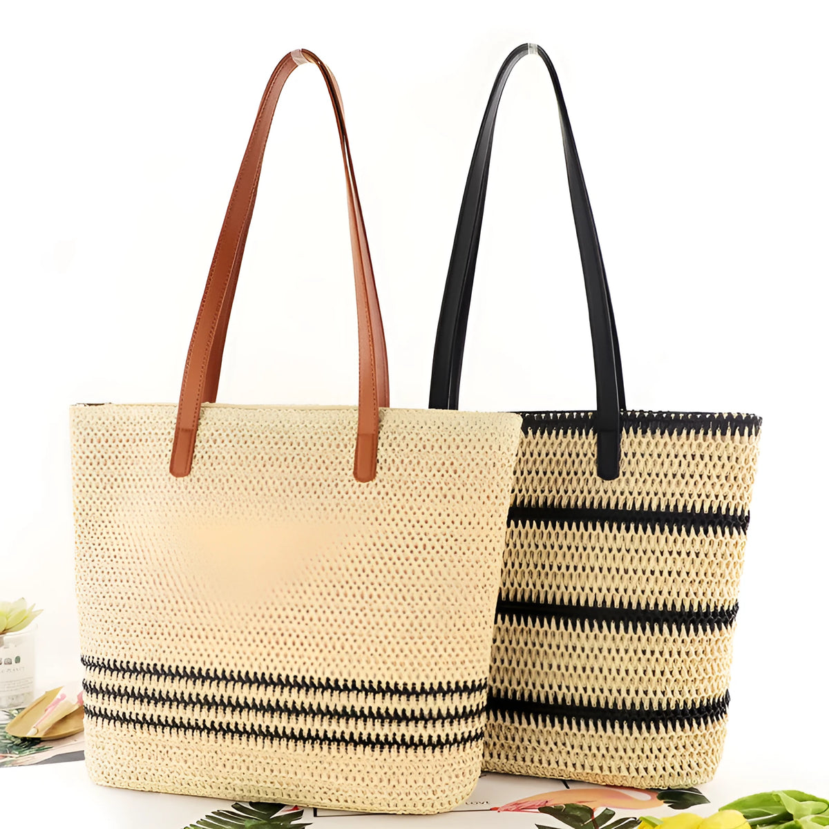 Large striped straw woven handbag with 64cm shoulder strap and polyester lining, shown in khaki or black