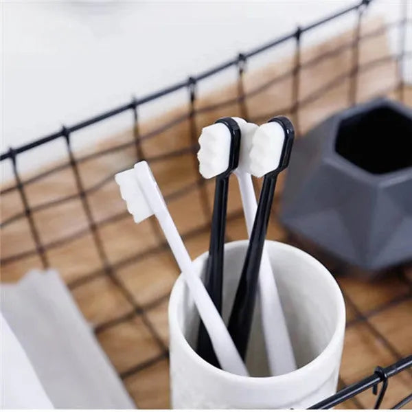 Micron soft toothbrush with 20000 bristles, white handle and wavy bristle head, on white background