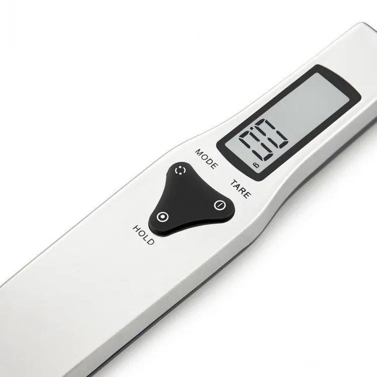 Smart digital measuring spoon with built-in electronic scale showing 0-30ml volume capacity