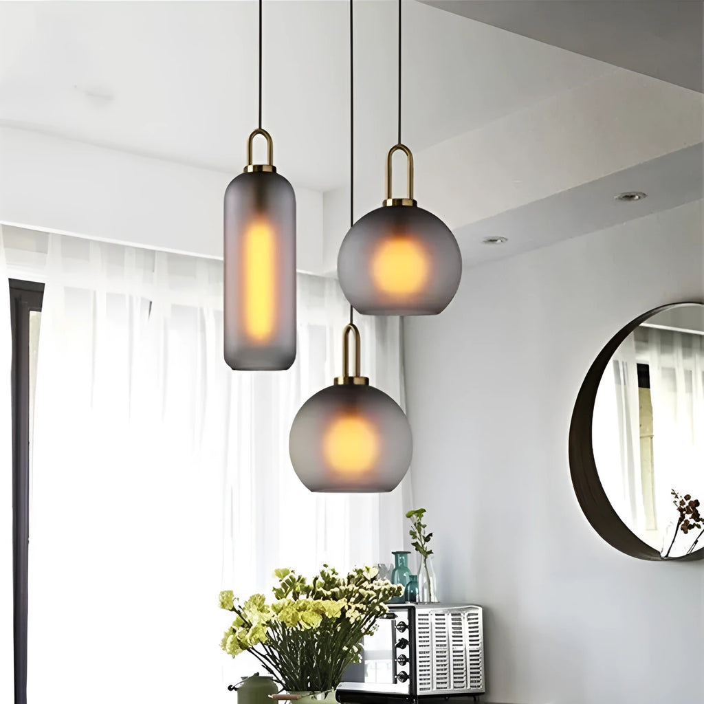 Nordic glass fish-shaped chandelier with iron body and adjustable height for modern interiors