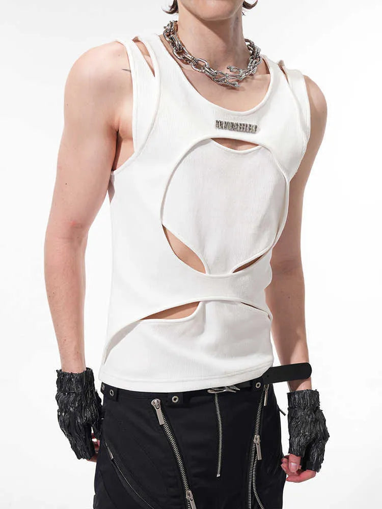 Man wearing a white, sleeveless, hollow-knit cotton waistcoat with a round neck.