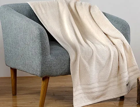 Six-piece cotton towel set showing bath, hand, and washcloth sizes in beige colour.