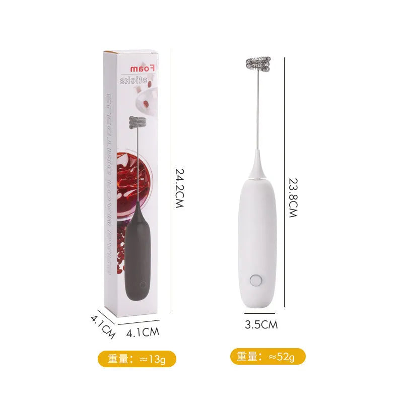 Black and white hand-held electric milk frother blender with modern design for coffee preparation