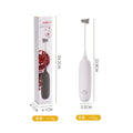 Black and white hand-held electric milk frother blender with modern design for coffee preparation