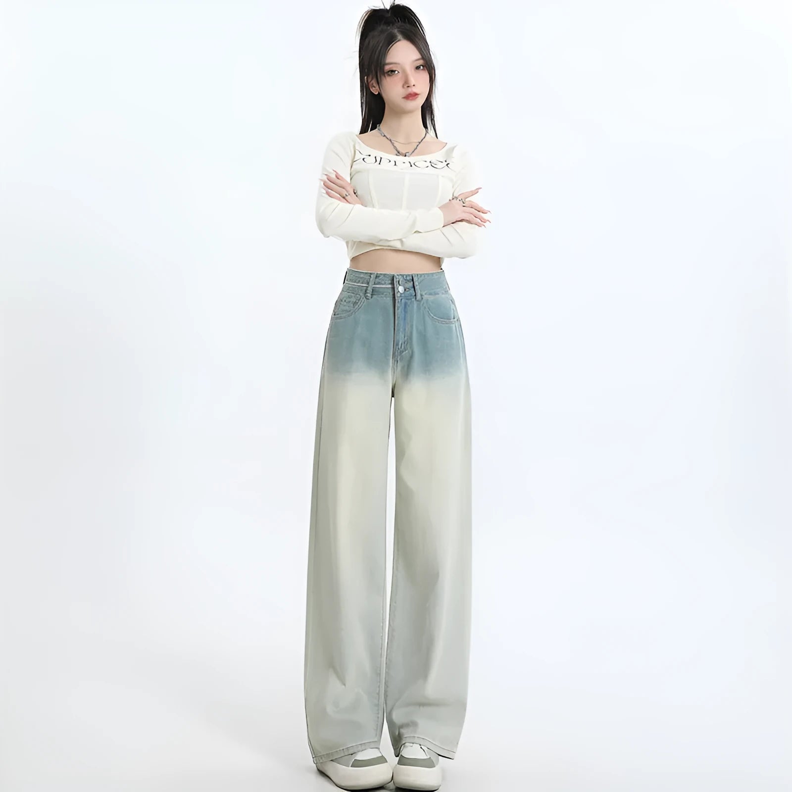 Women's gradient blue straight-leg wide-leg denim trousers laid flat.