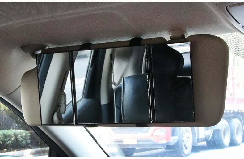 Silver folding car visor mirror shown closed and opened on a car sun visor.