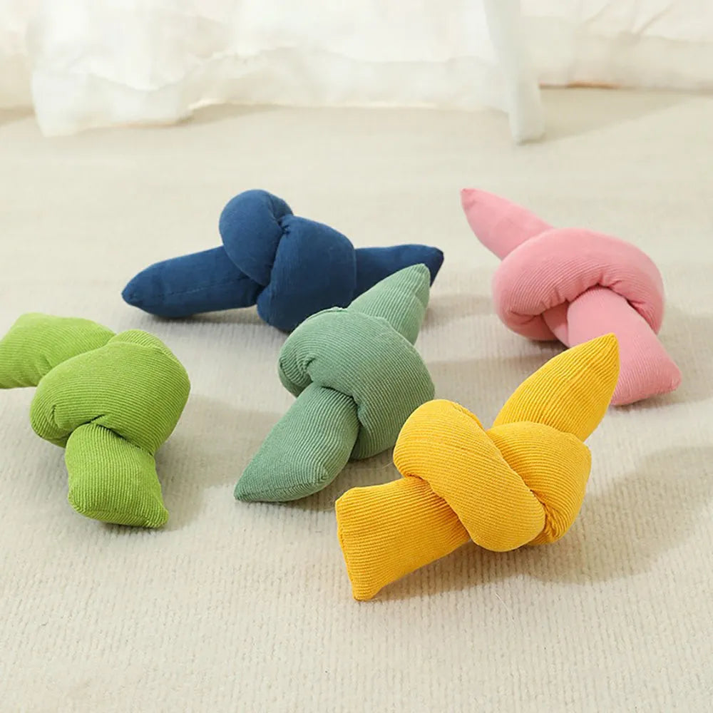 White natural cotton dog rope toy with multiple knots for tug play and dental cleaning
