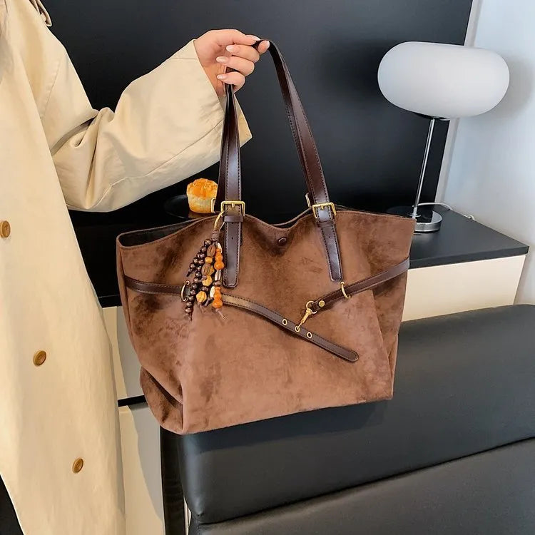 Retro large capacity women's shoulder bag in soft PU with sewing thread detail, shown in wine red, black, brown, and coffee.