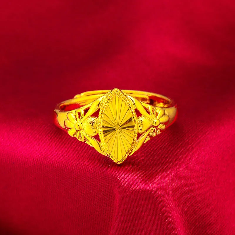 Gold electroplated brass ring with geometric open diamond flower design
