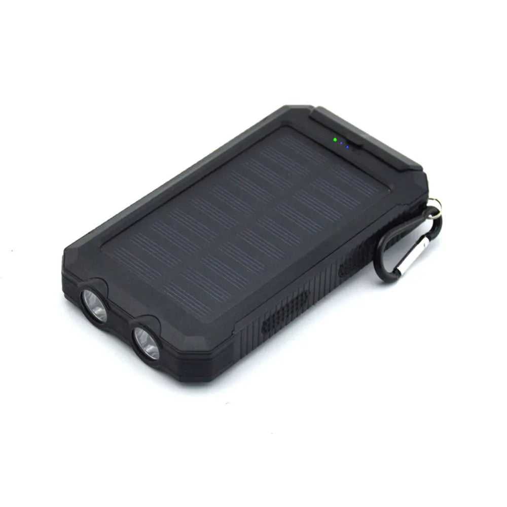Black solar power bank with compass, LED flashlight, and 20000mAh capacity for mobile phone charging.