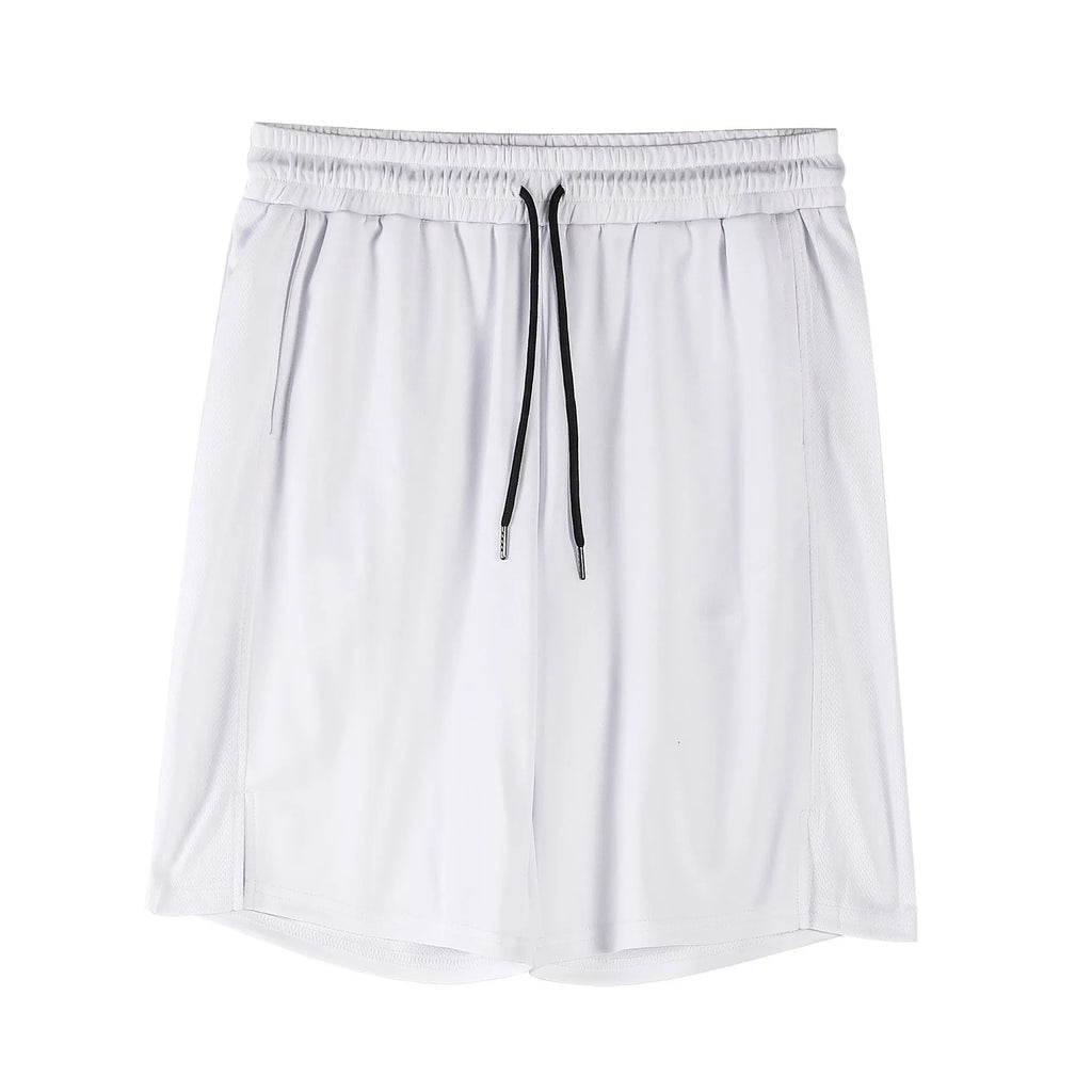 Man wearing black quick-dry mesh capri shorts with a loose, casual fit.