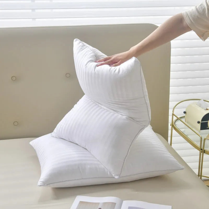 White cotton satin stripe pillow with a feather cotton fill, shown in low, medium, and high loft options.