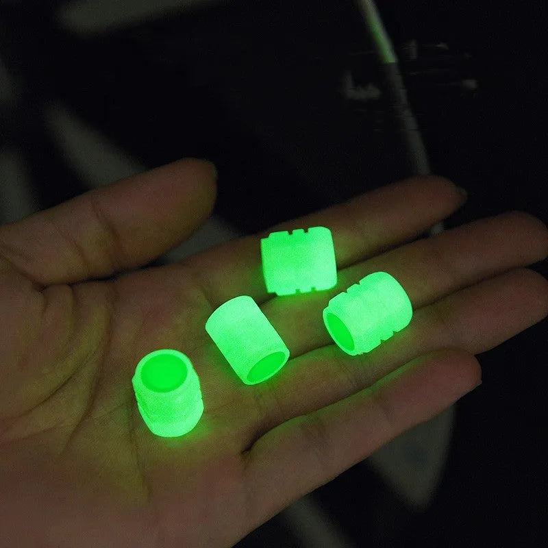 Glow-in-the-dark rubber car valve caps in 16x12mm size showing luminous property