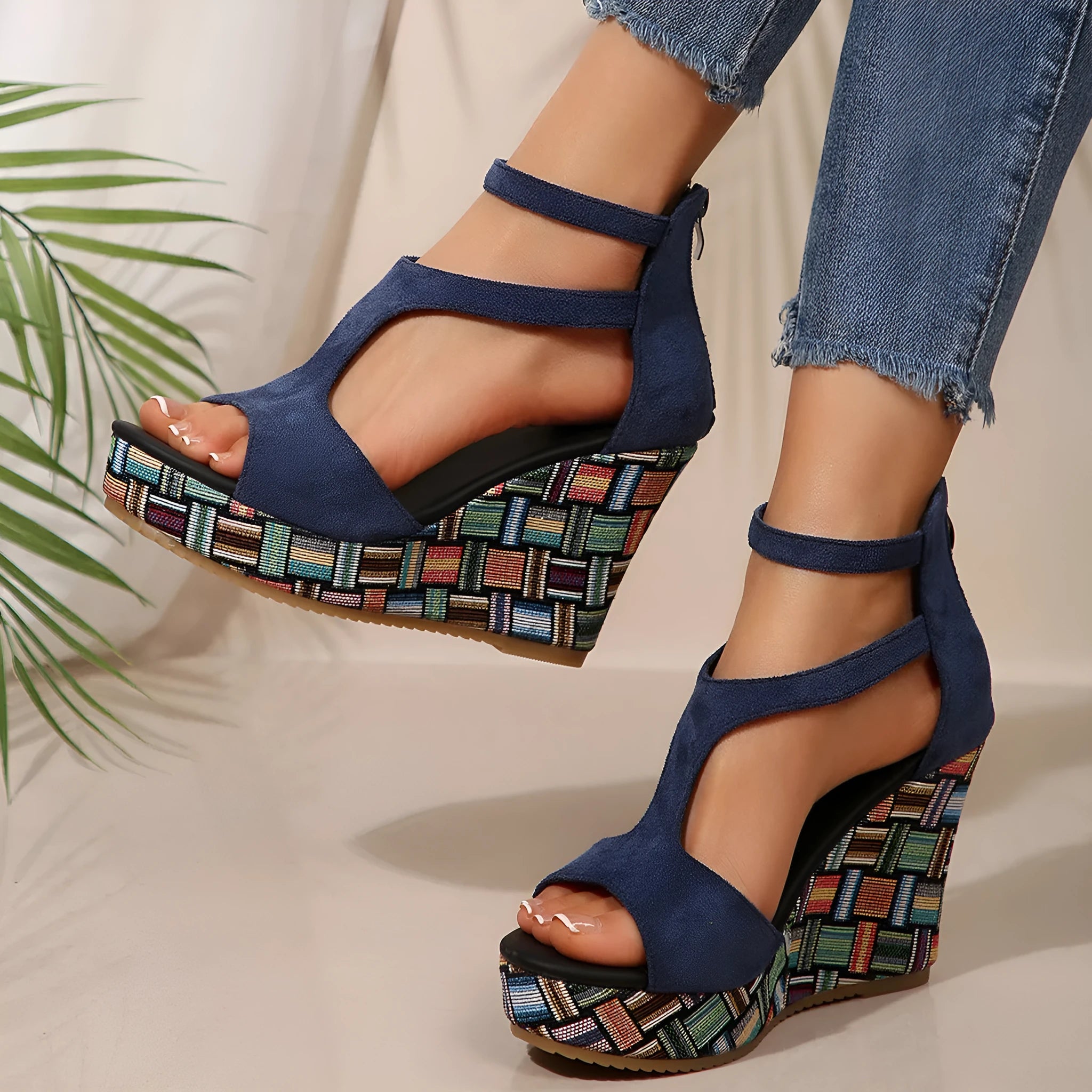 Women's cream white ankle-strap sandals with a buckle and thick rubber sole, shown from the side.