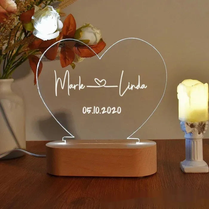 Transparent custom acrylic night light with personalised text, measuring 20cm by 11.5cm.