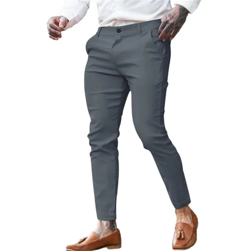 Men's slim fit pencil pants in twill cotton stretch fabric shown in a solid colour.