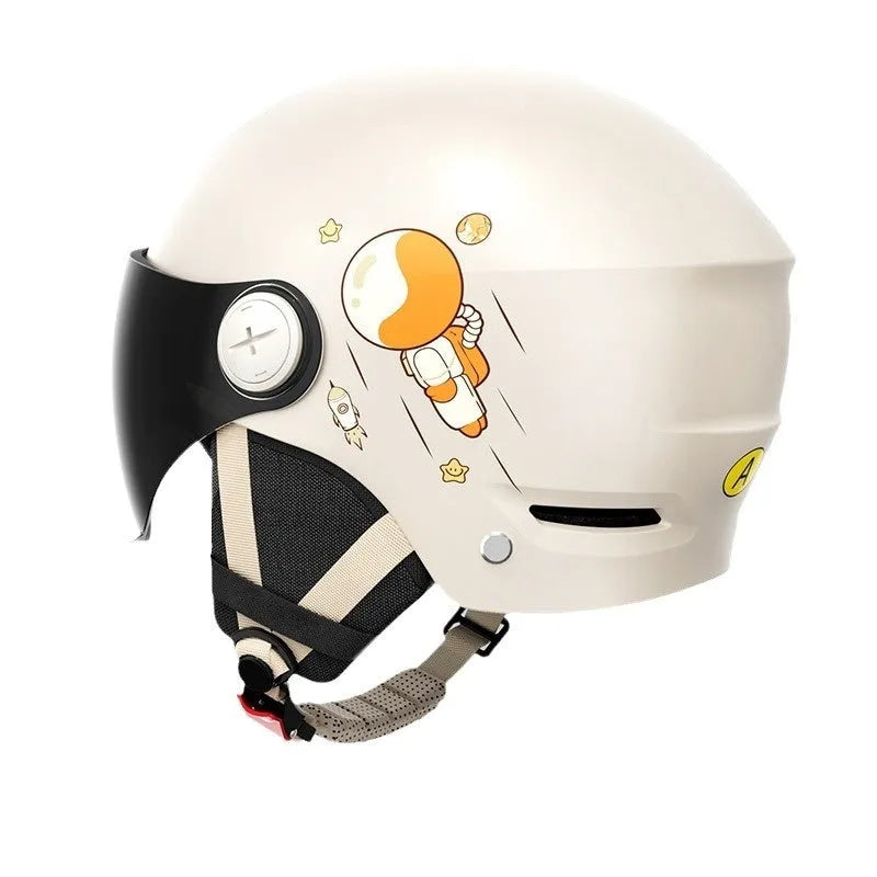 Khaki coloured open-face motorcycle helmet with a mirrored sun visor attached on a table.
