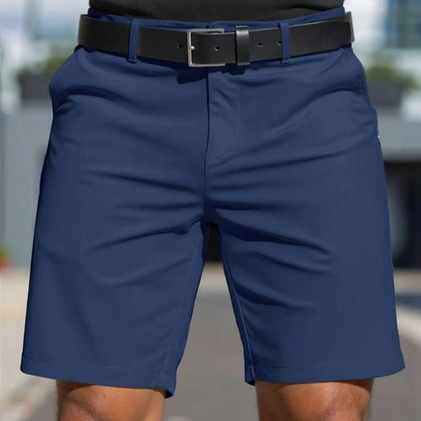Men's straight cut polyester shorts in solid colours with elastic waistband and fifth pants length