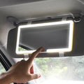 Compact rectangular LED makeup mirror designed for car sun visor mounting.