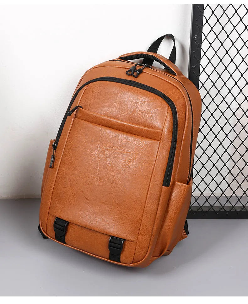 Men's large capacity PU backpack in khaki, 47x33x18cm, with curved shoulder straps and main compartment opening