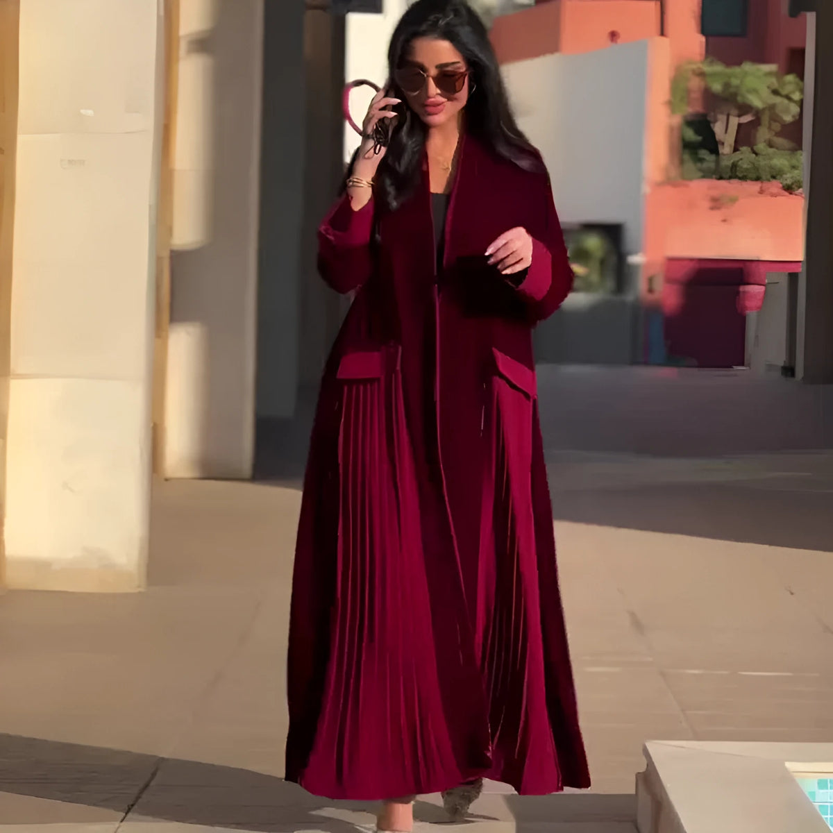 Women's pleated stitching coat in wine red, long sleeves, polyester fabric, street hipster style, front view.