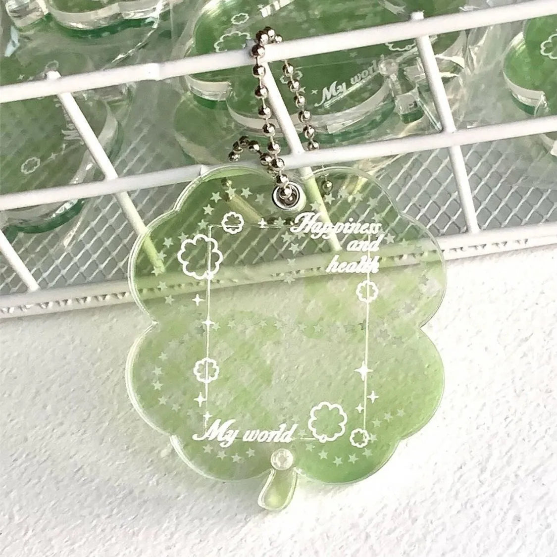 Acrylic four-leaf clover pendant bag lanyard phone keychain in three colours: elegant blue, grass green, mint green