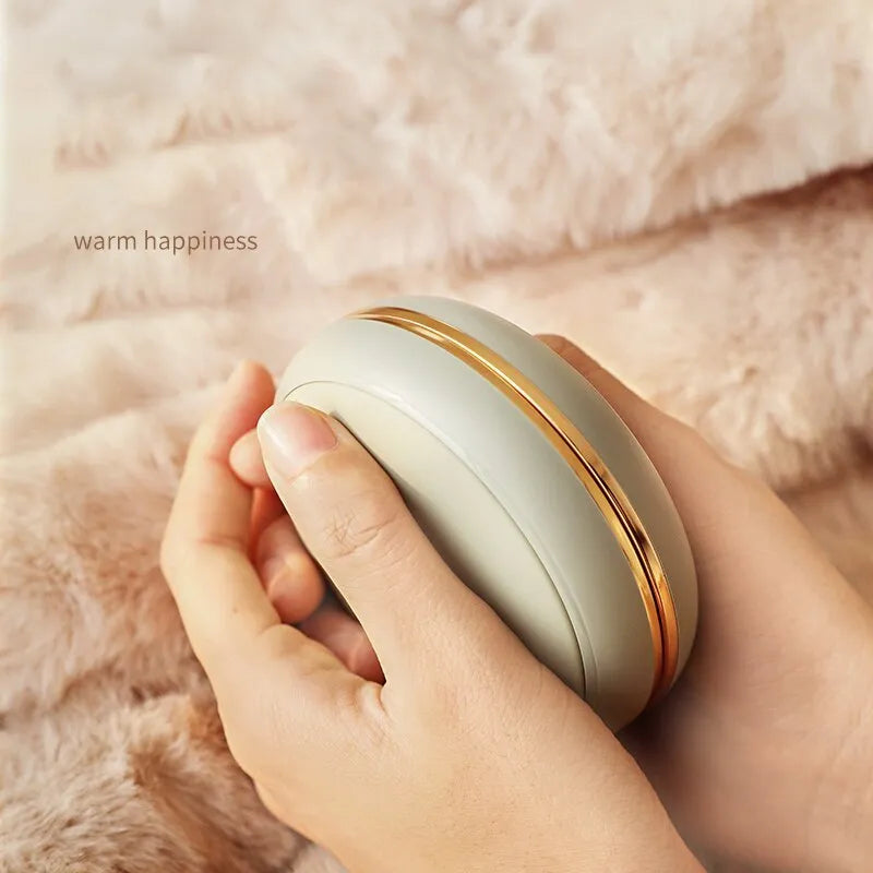 Portable 10000mAh USB power bank hand warmer in brown, with Type C interface and dual gear switch