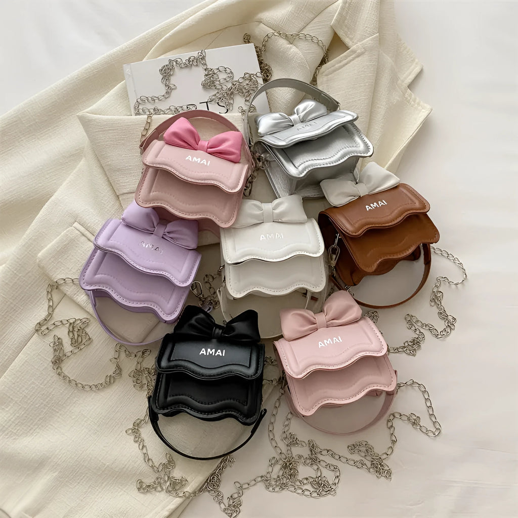 Mini crossbody bag in seven colour options with single shoulder strap and structured PU construction