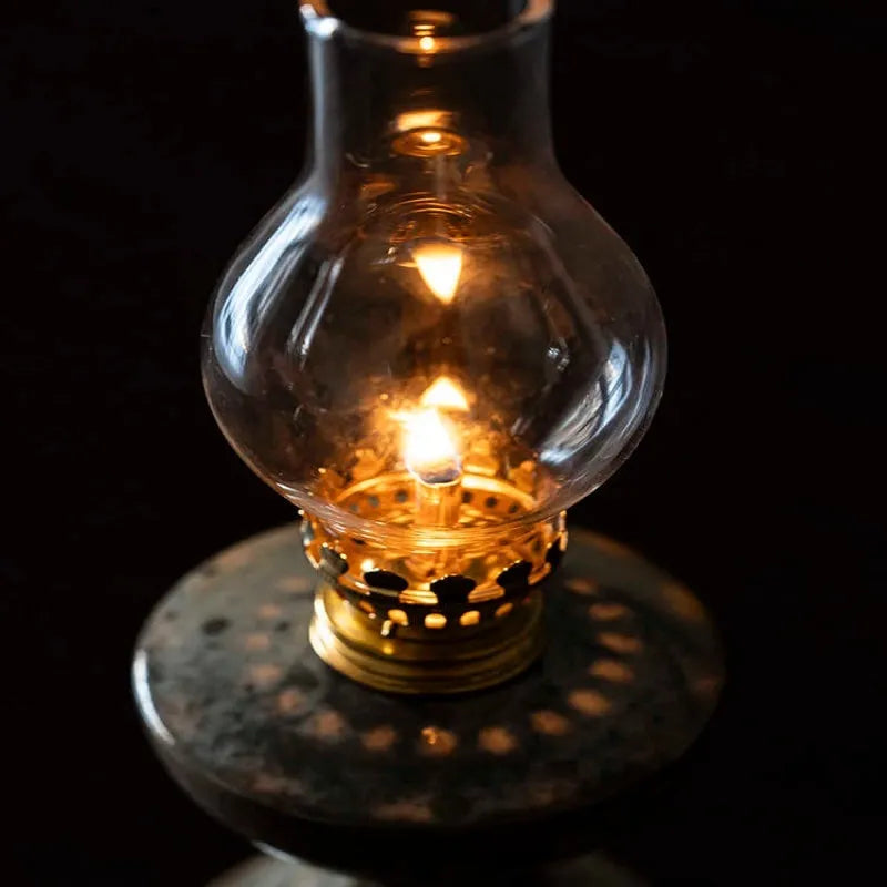 Retro split design black antique handmade kerosene lamp with underglaze finish on a shelf