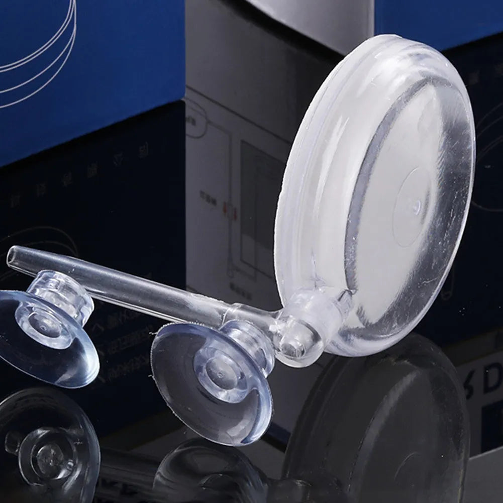 White transparent PC aquarium air refiner with nano bubbles and suction cups, shown on glass tank