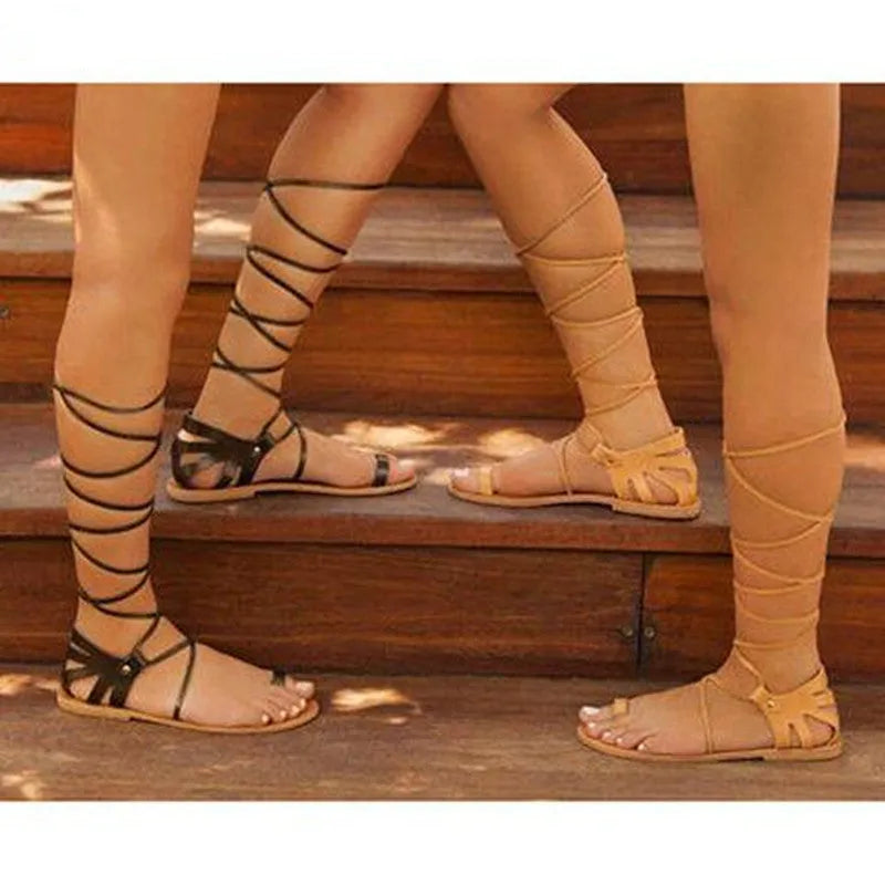 Lace-up flat sandals for women with artificial PU upper and buckle fastening in black