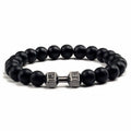 Natural volcanic stone beads bracelet black lava unisex electroplated black matte gold dumbbell detail