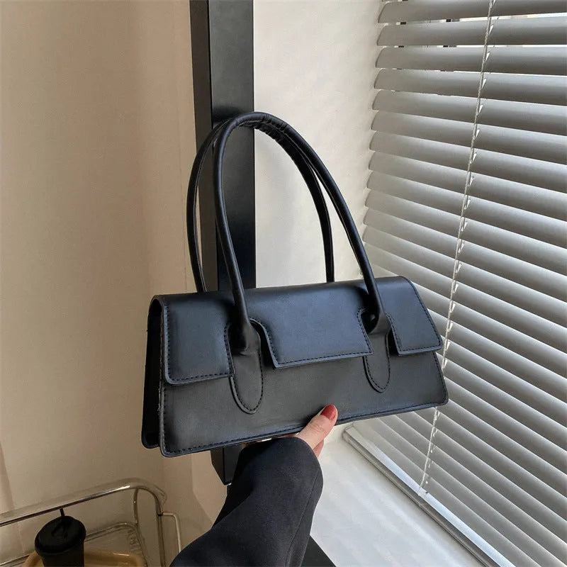 Women's retro small square bag in PU material with single shoulder strap and stitching details available in multiple colours