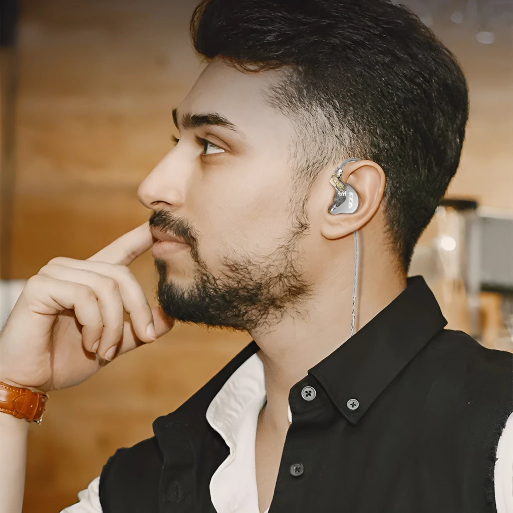 Tuned dynamic in-ear HIFI wired headset with moving coil driver, oxygen-free copper cable, and silicone eartips in translucent black finish