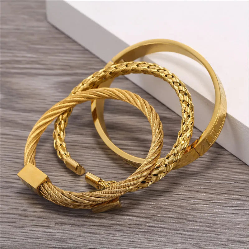 Three alloy bracelets with geometric design in black, gold and silver, unisex electroplated wristwear set