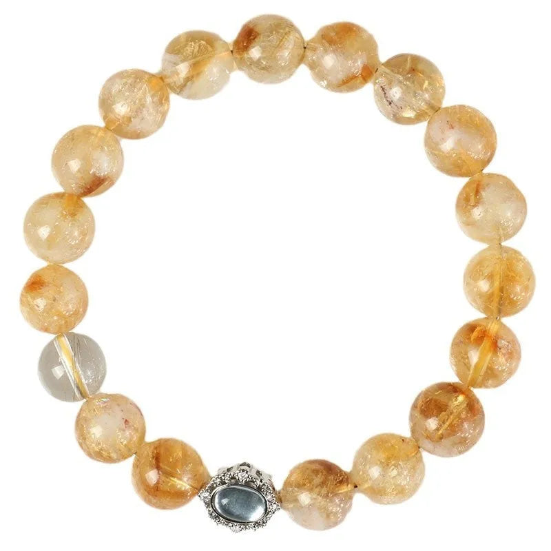 10mm geometric-cut citrine bracelet with hand-ground surface texture on wrist