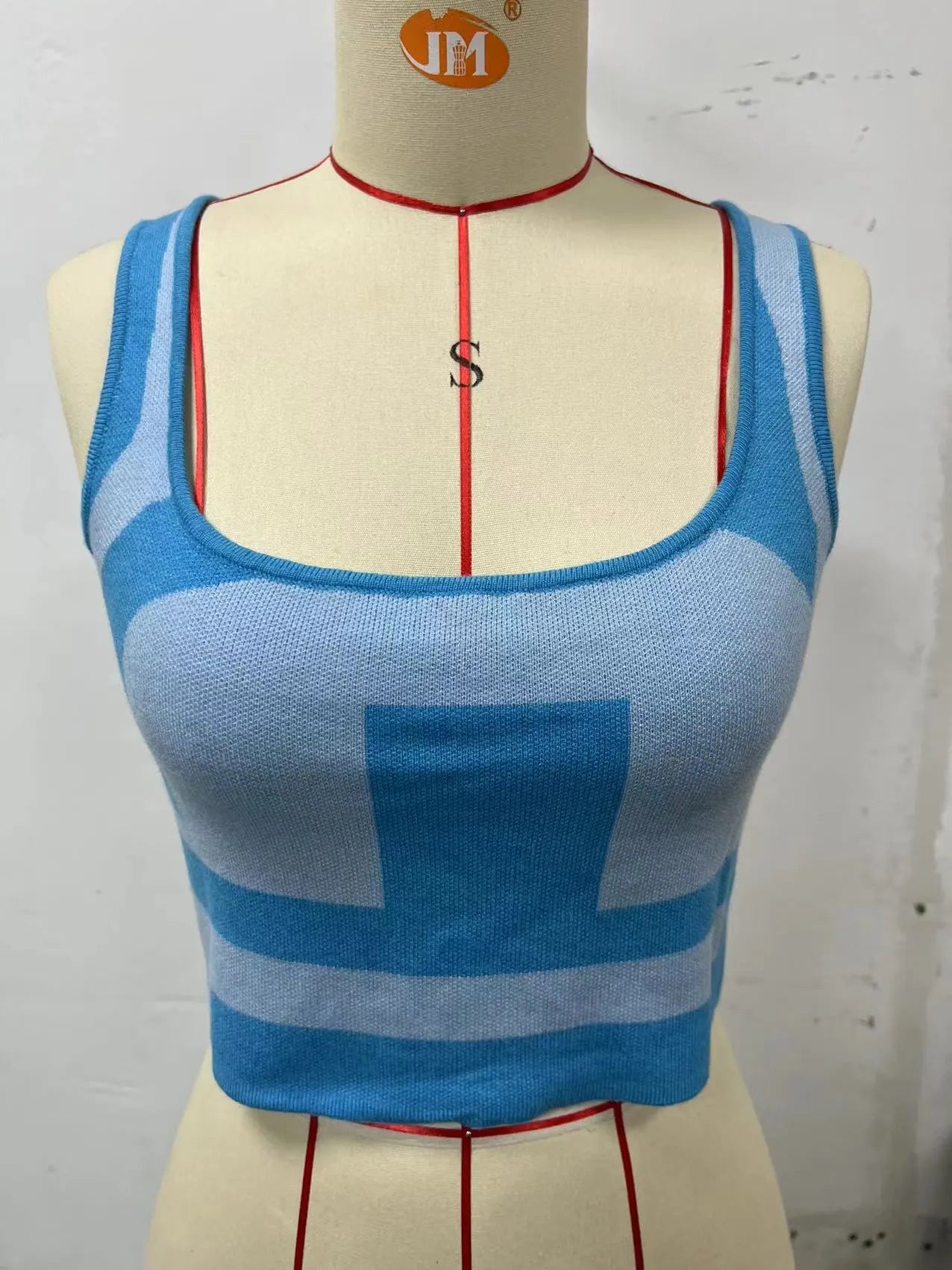 Women's U-collar camisole vest in slim-fit polyester fabric shown in multiple colours