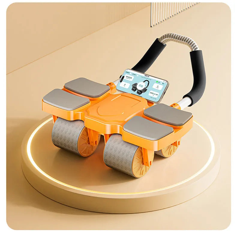 Black automatic rebound abdominal wheel with four blue polyurethane rollers and ergonomic handles on a wooden floor.