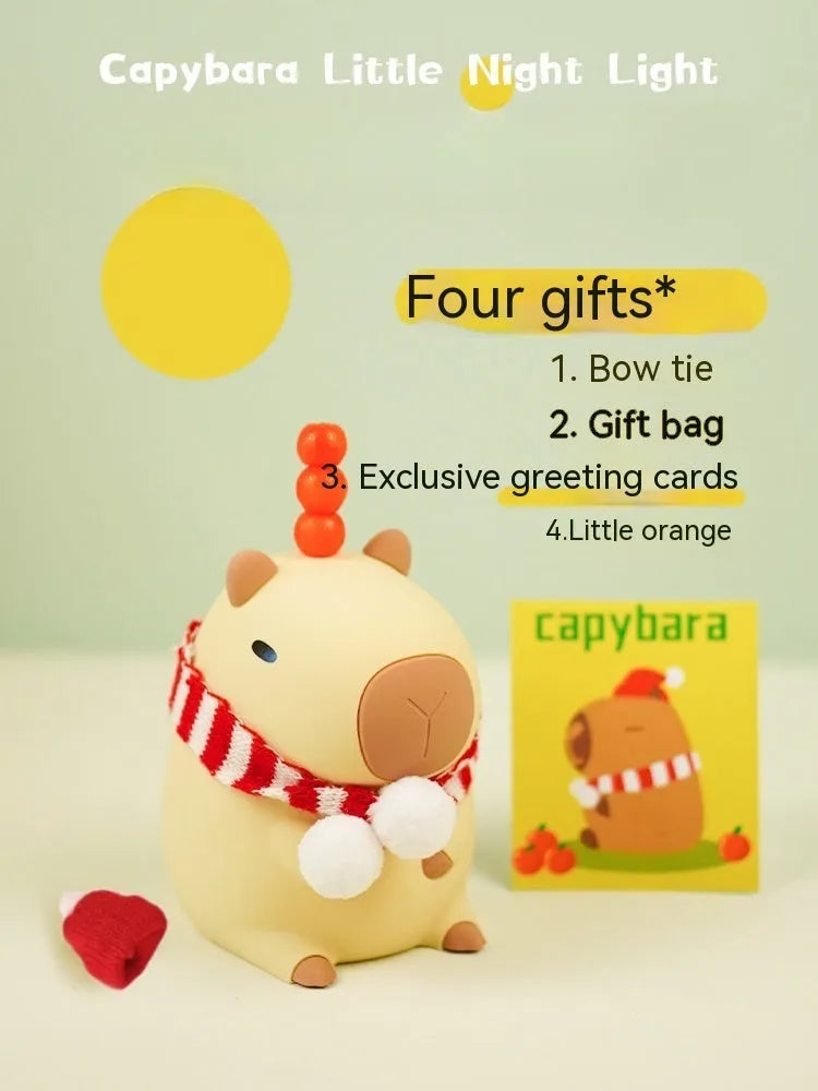 Cute brown Capybara silicone night lamp with soft glow on a bedside table.