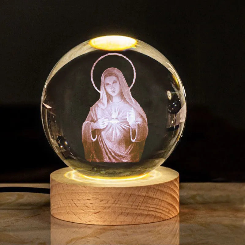 6cm white crystal ball desk ornament with laser-engraved cross design on a solid wood warm light base.