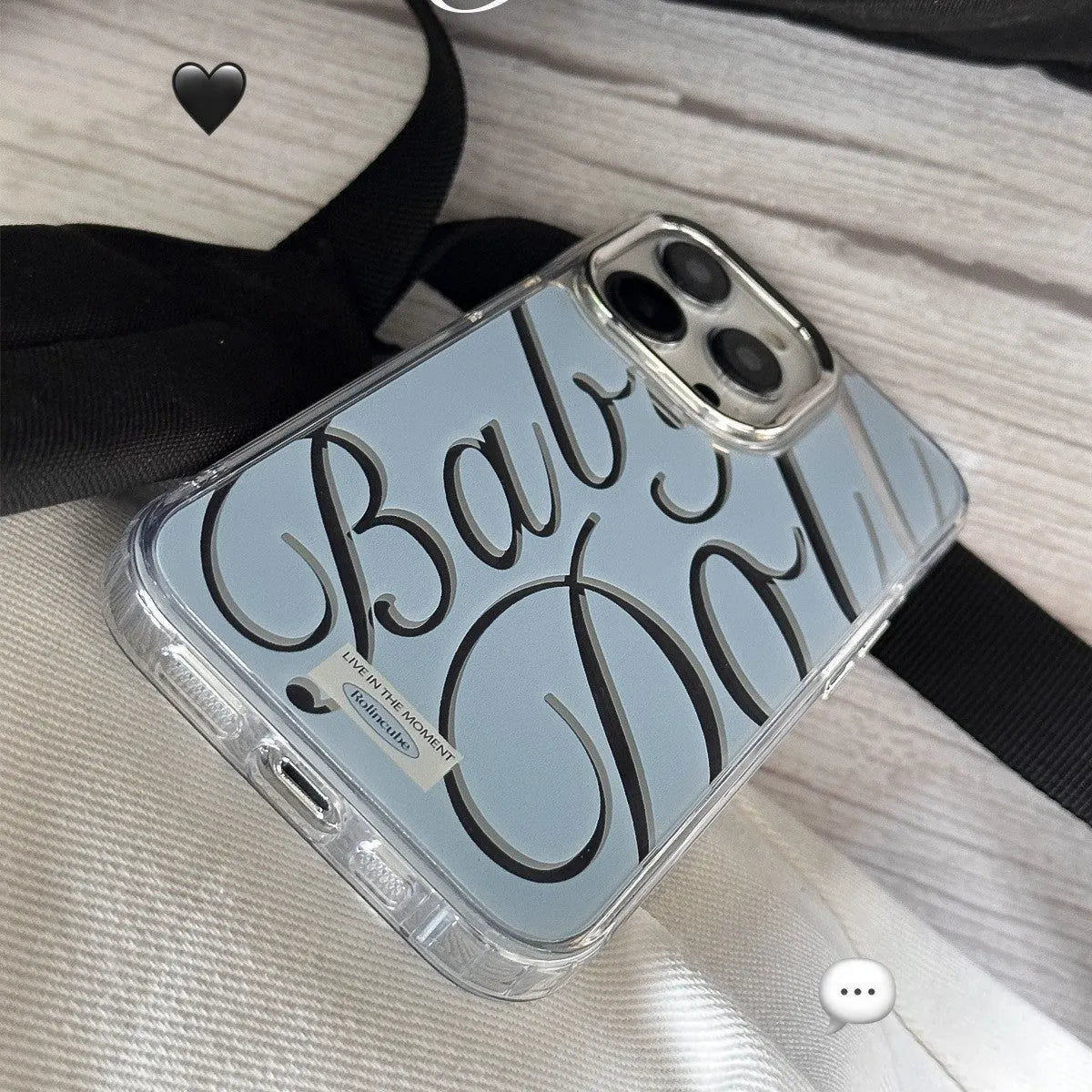 Transparent blue mirror iPhone case with JMKJ English letters showing frosted finish