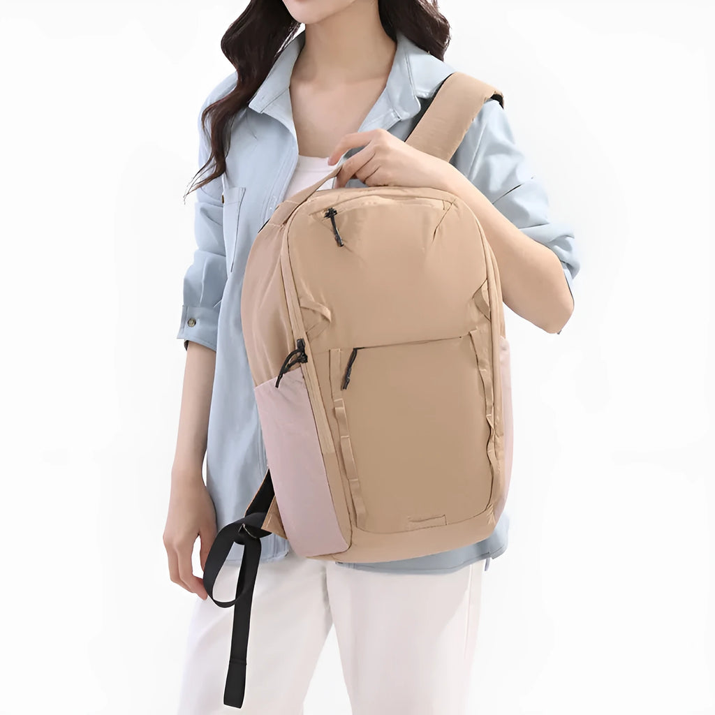 Waterproof Taslan backpack in solid colour with curved shoulder straps and splicing design elements