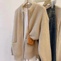 Beige soft wind sweater coat cardigan with long sleeves showing temperature-sensitive viscose fabric texture