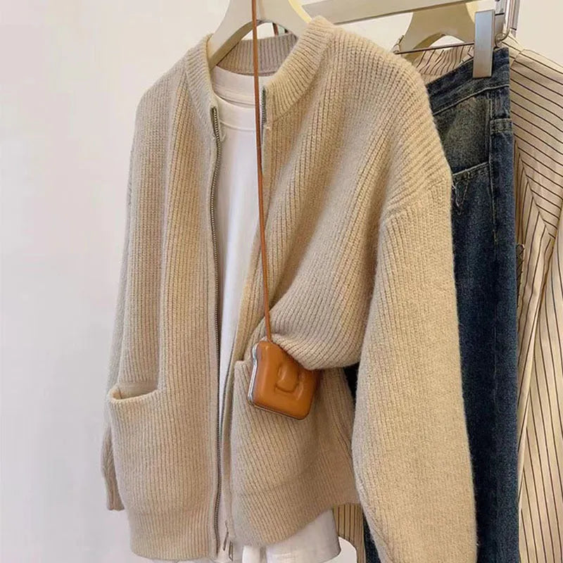 Beige soft wind sweater coat cardigan with long sleeves showing temperature-sensitive viscose fabric texture